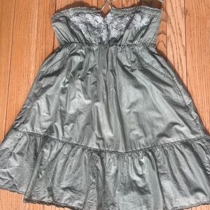 Hollister Green with white embroidered flowers. Strapless. Lined. Pockets.